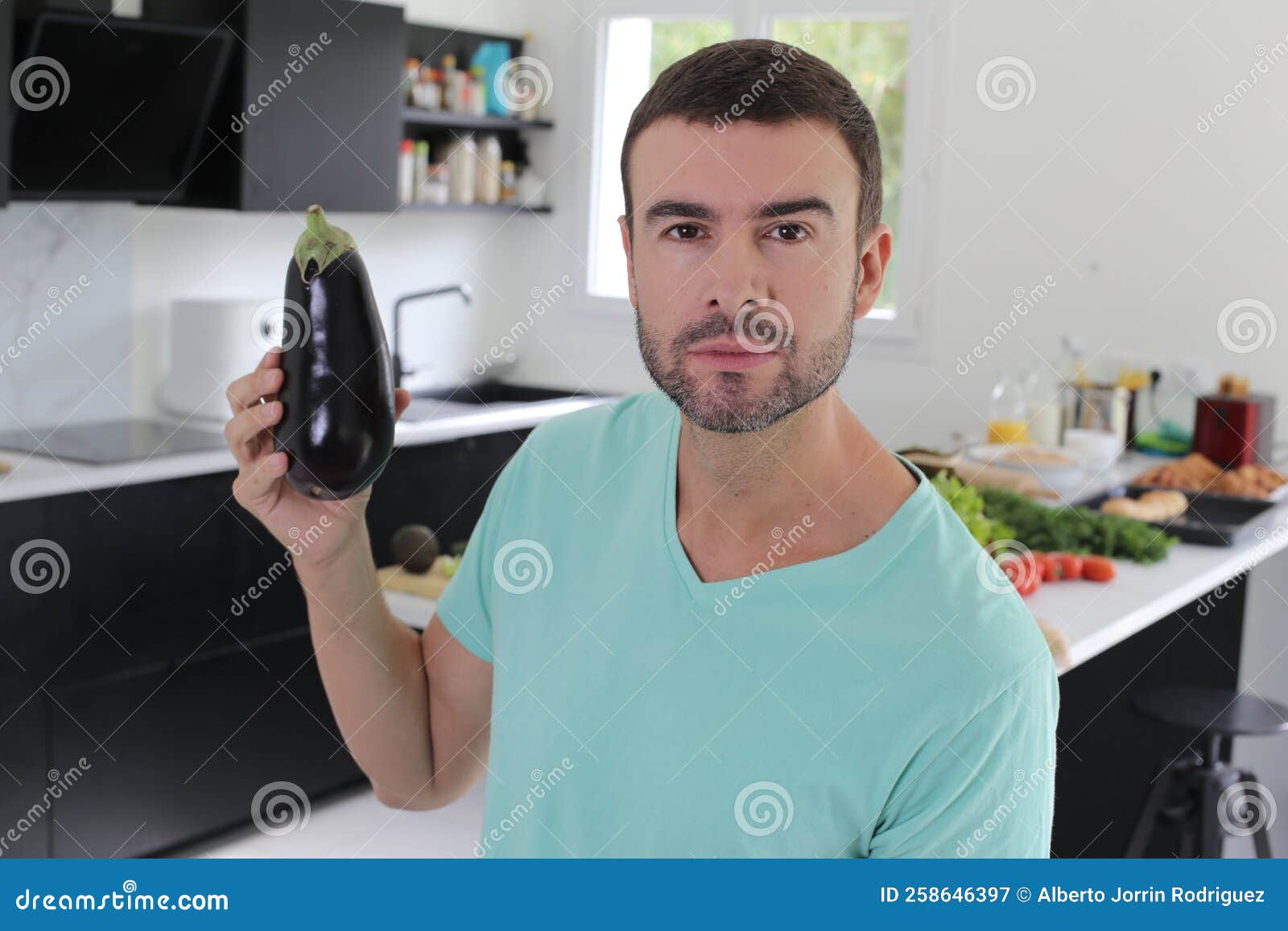 Man Holding a Delicious Eggplant Stock Image Image of food, caucasian