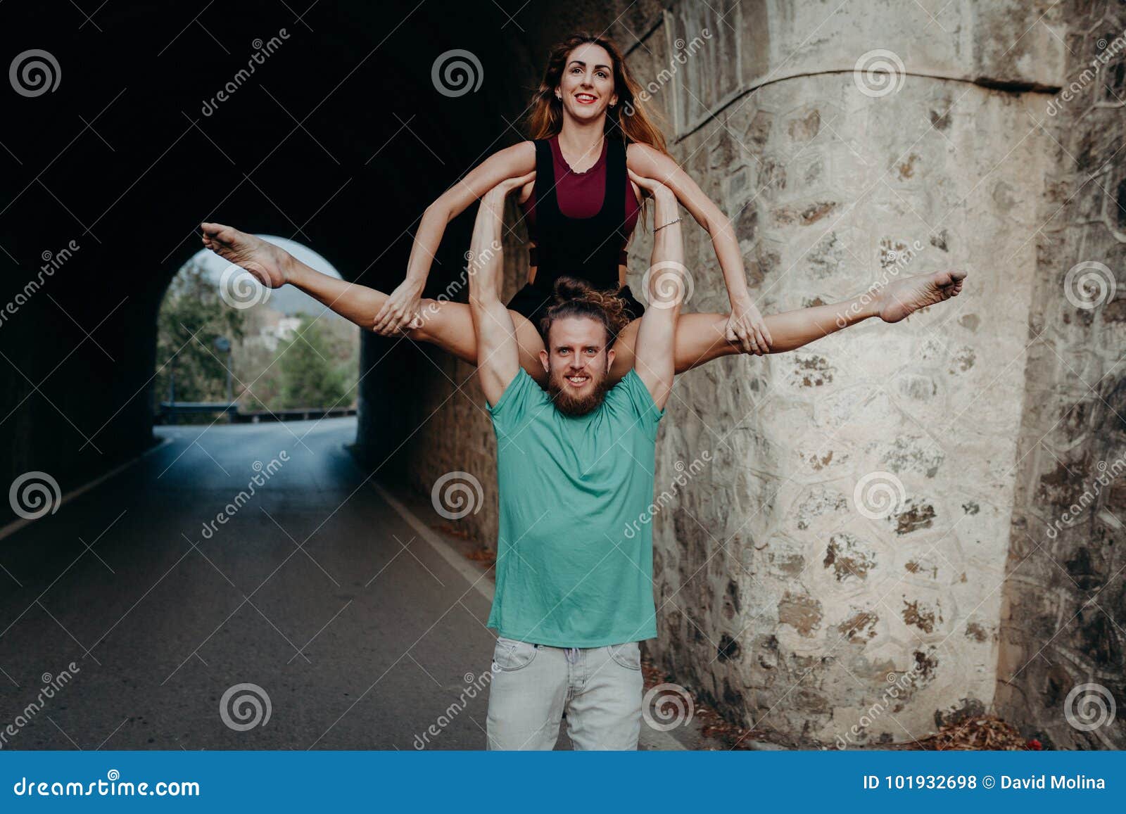 https://thumbs.dreamstime.com/z/man-holding-elevating-woman-arms-gymnastics-dance-young-alternative-couple-dancing-road-101932698.jpg