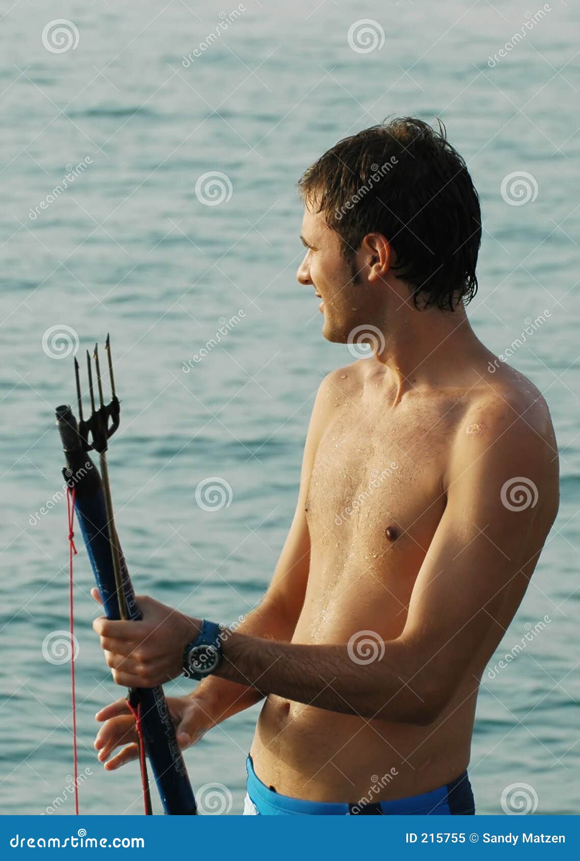 Man Holding Fishing Harpoon Stock Photos - Free & Royalty-Free Stock Photos  from Dreamstime