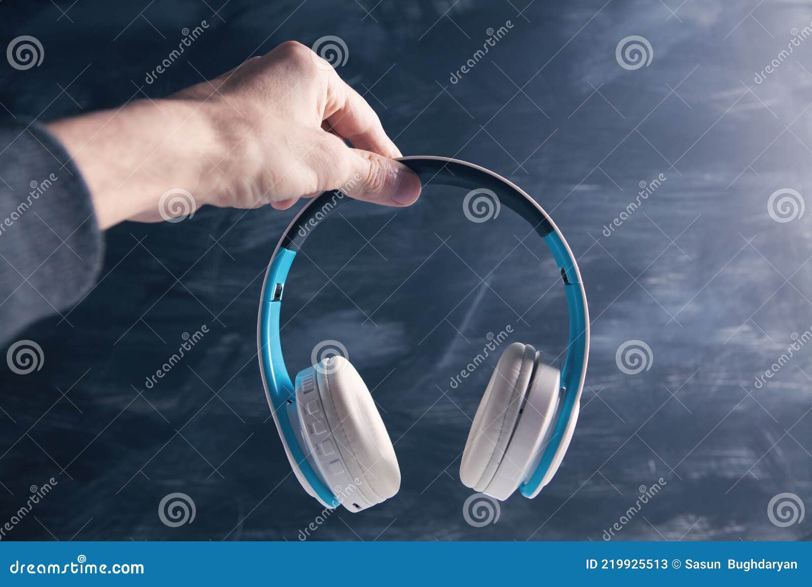 Man Holding Headphones in Her Hand Stock Image Image of listening