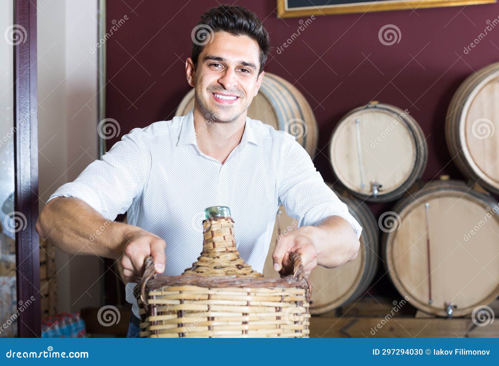 Man Holding Large Wine Bottle Stock Photo Image of store, winery