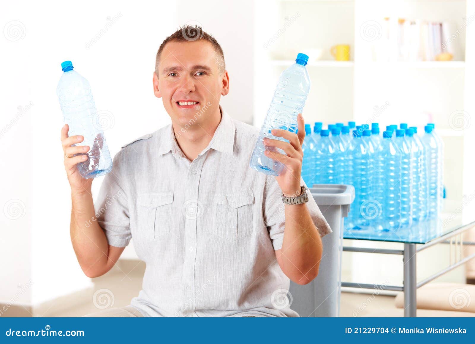 Man Holding Plastic Bottles Stock Photo Image of ecological, ecologic 21229704