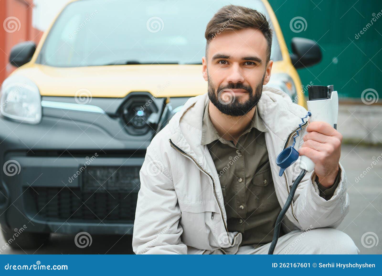 Man Holding Power Connector for Electric Car Stock Image Image of