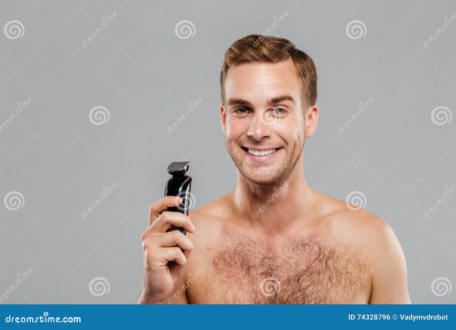 Man Holding Razor Over Gray Background Stock Photo Image of camera