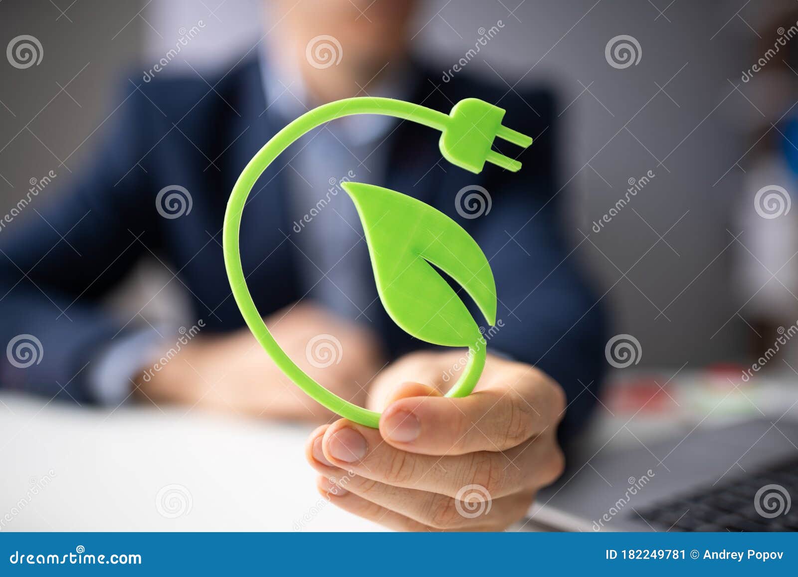 man holding renewable green energy concept