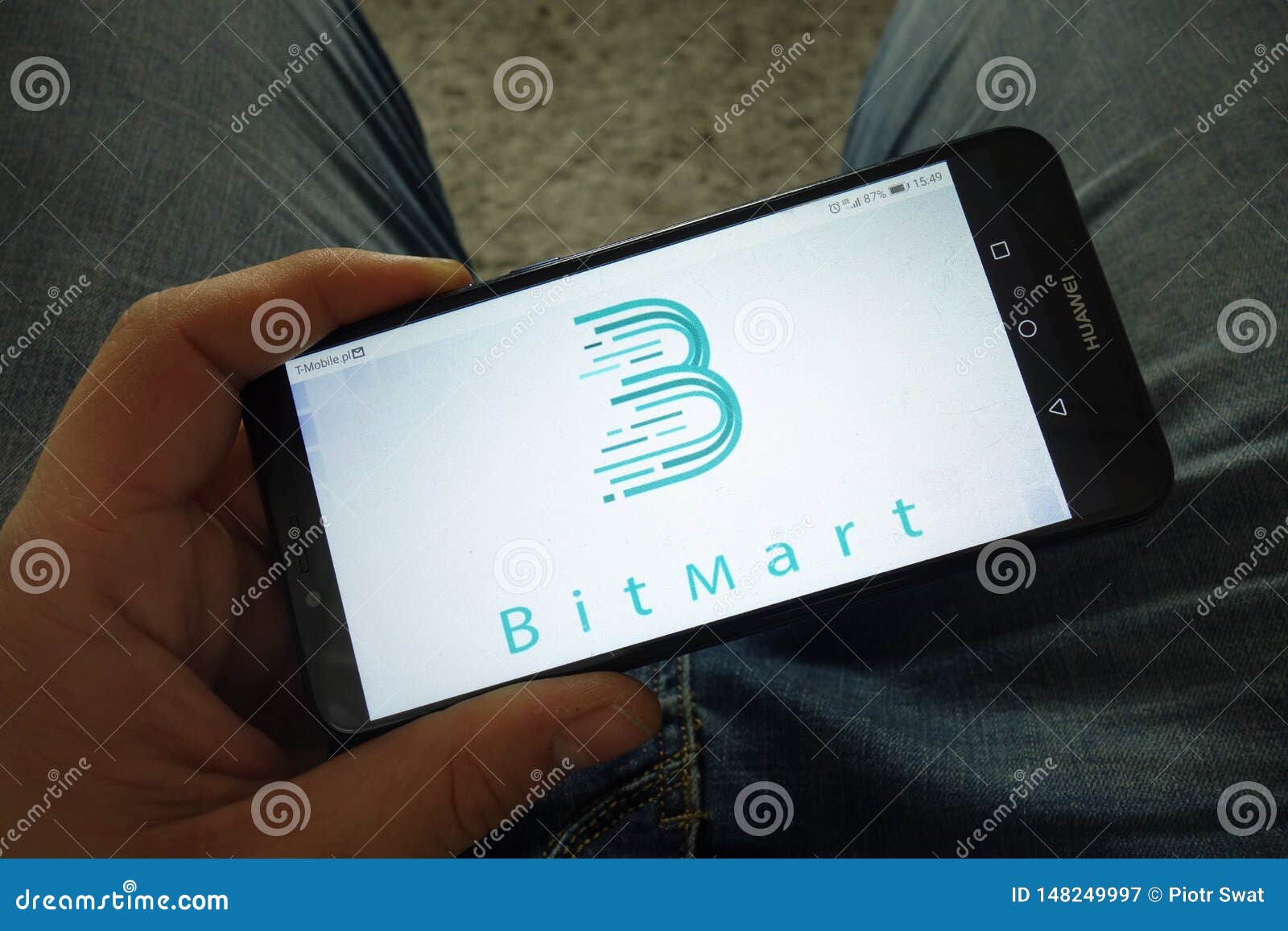 Man Holding Smartphone With BitMart Cryptocurrency ...