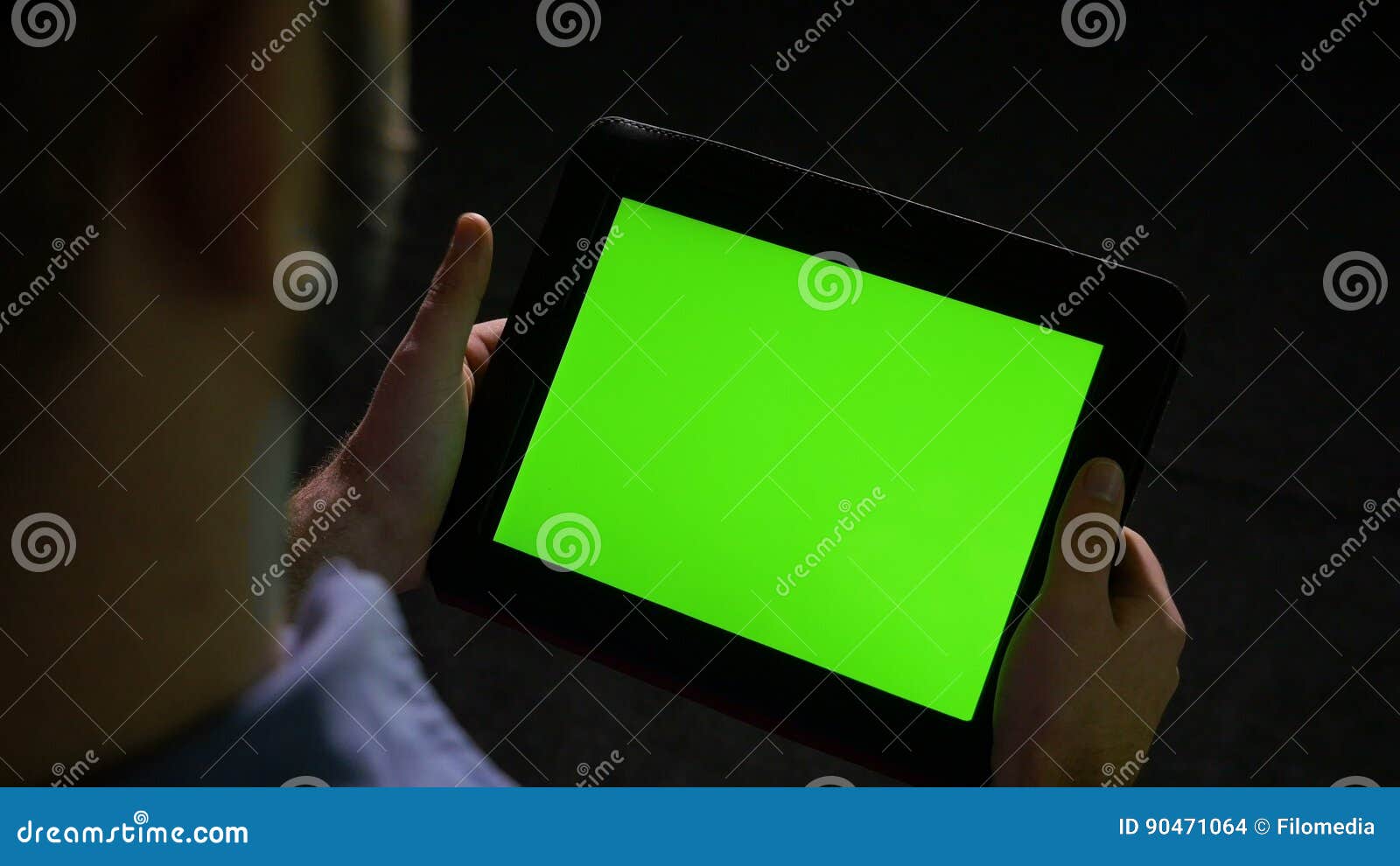 Man Holding a Tablet Pc with Green Screen on Black Background Stock Footage Video of finger