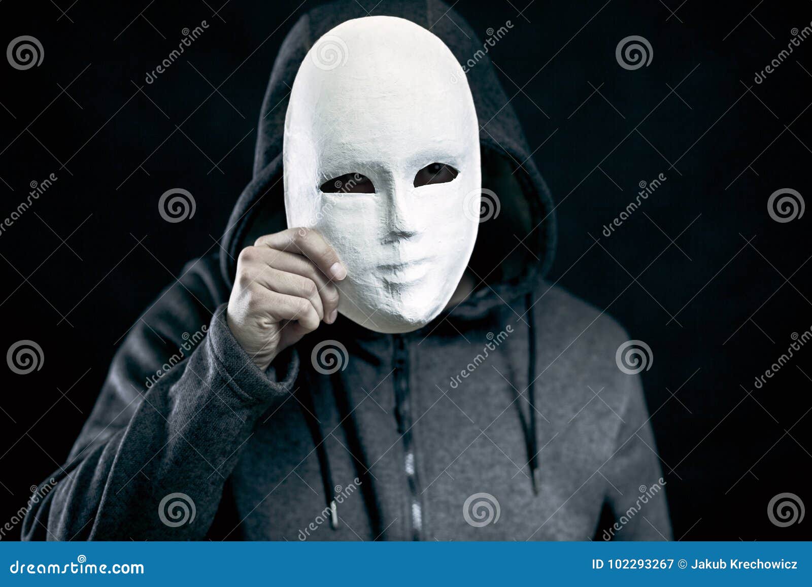 Man holding white mask stock image. Image of hand, face 102293267