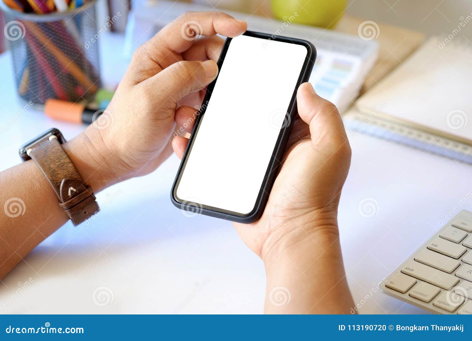 Man Holdng A Smart Phone On Desk In Office Stock Photo Image Of