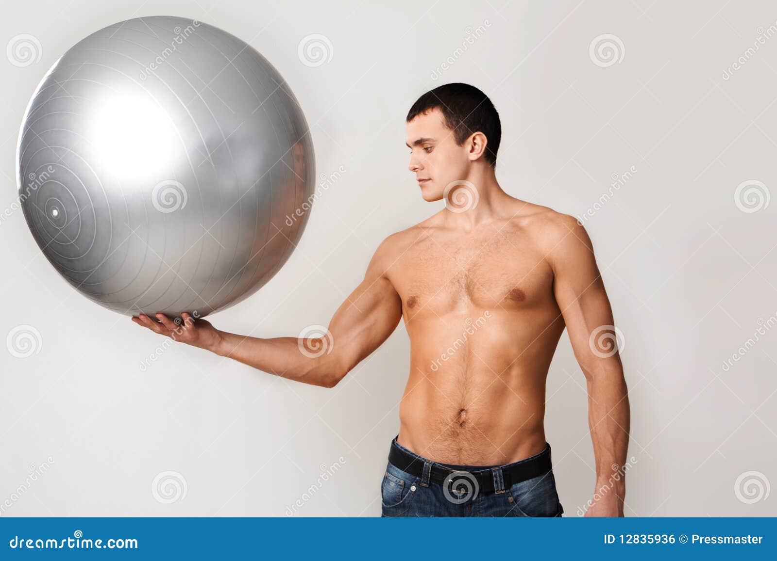 Man holds ball stock photo. Image of perfect, healthy 12835936