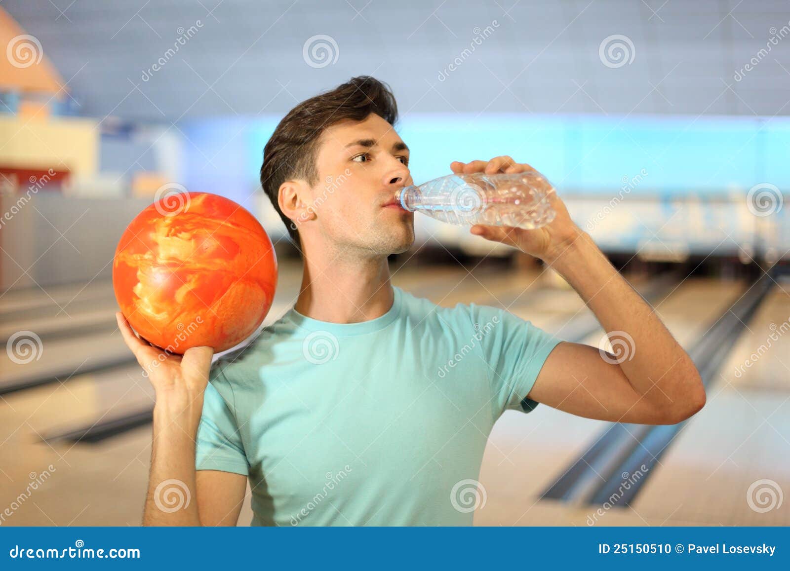 Man Holds Ball and Drinks Water in Bowling Club Stock Photo Image of