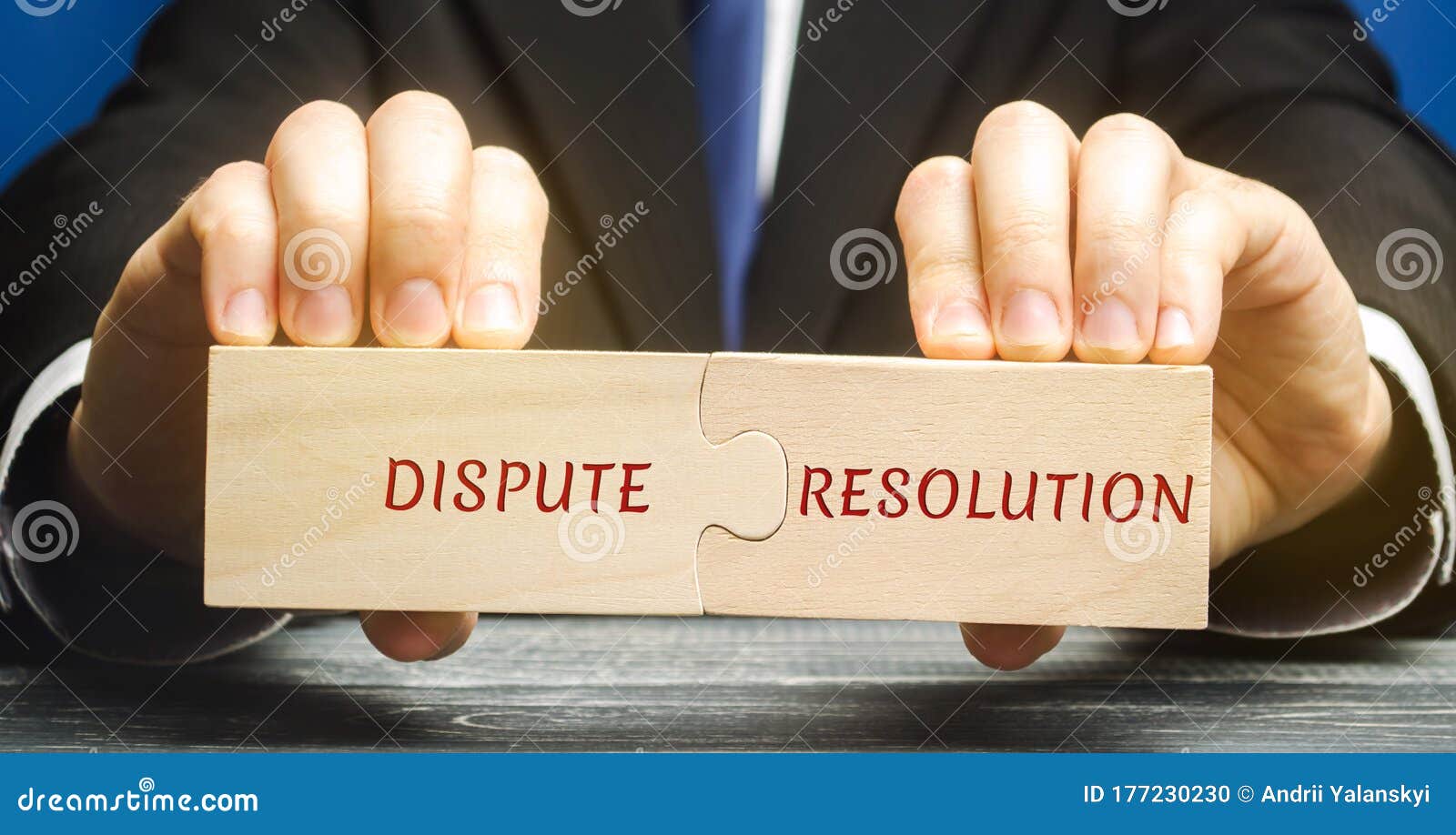 man holds wooden puzzles with the words dispute resolution. law and justice concept. litigation, arbitration, mediation. adr.