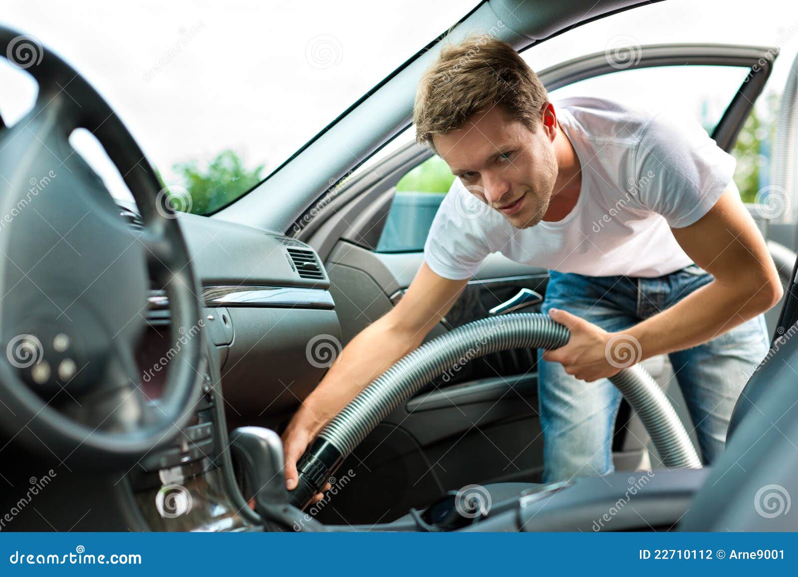 Man is Hoovering or Cleaning the Car Stock Photo Image of hoover