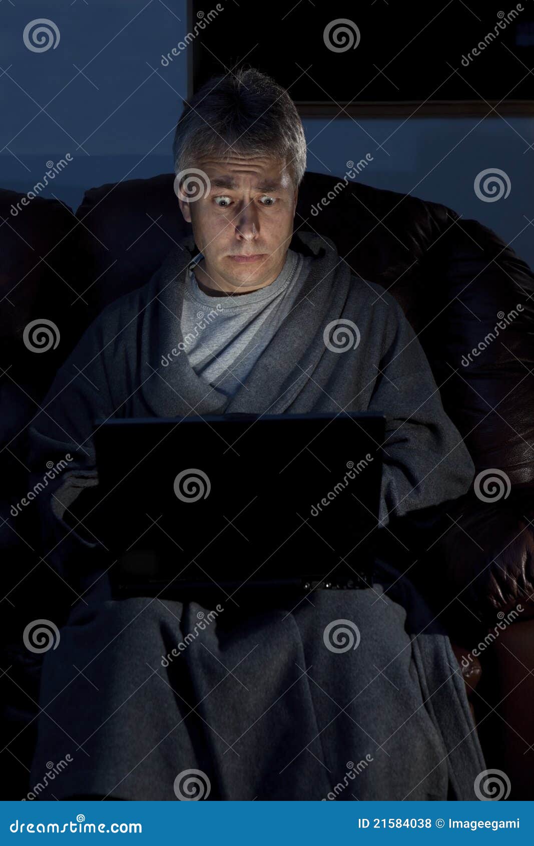 man in housecoat working late series