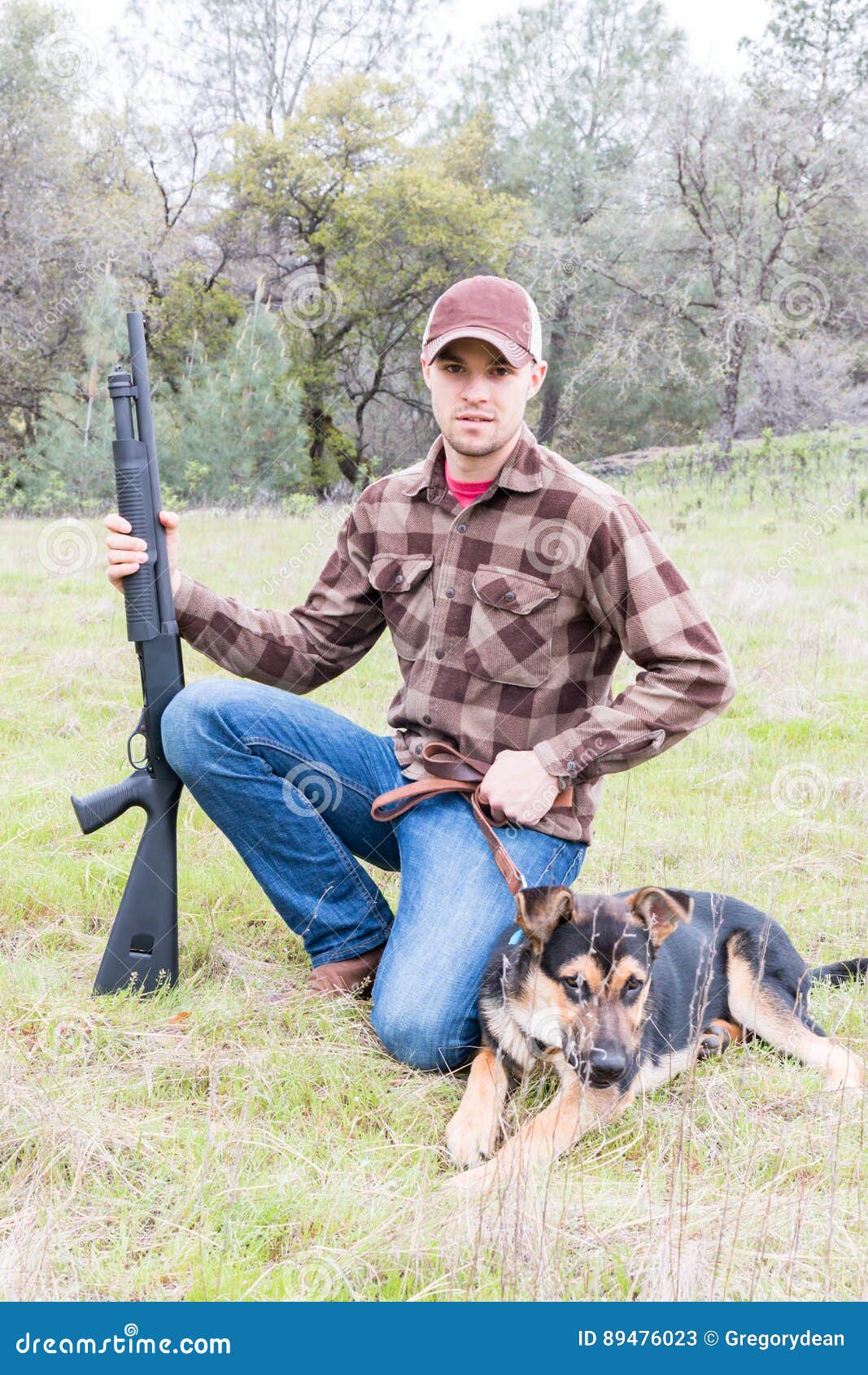 Man Hunting with Dog stock image. Image of field, rottweiler 89476023