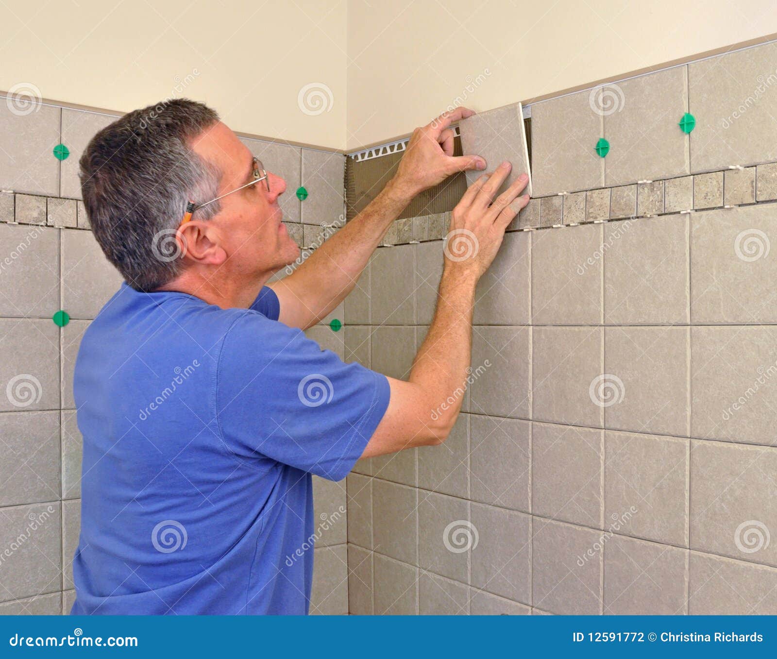 Man Installing Ceramic Tile In Bathroom Stock Photo Image Of