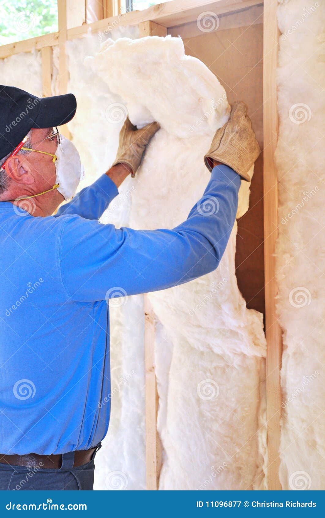 Man Installing Fiberglass Insulation Stock Image Image of contractor