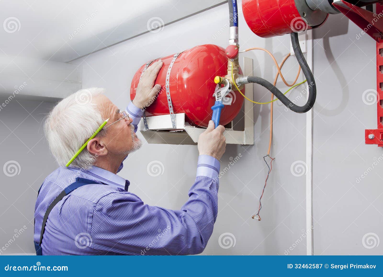 Man Installs Fire Extinguisher Stock Image Image of control, home
