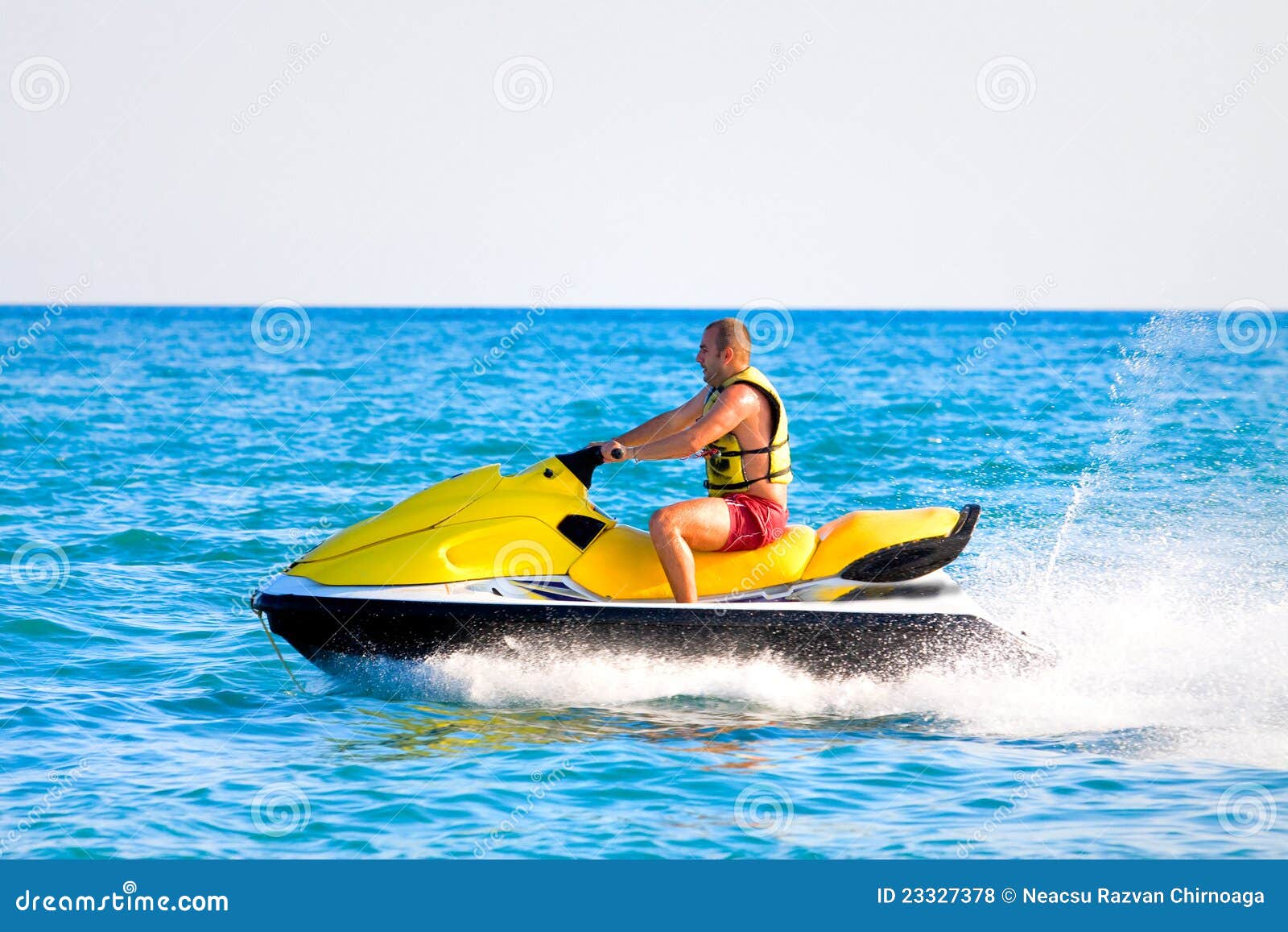 Man on jet ski stock photo. Image of blue, ride, object 23327378