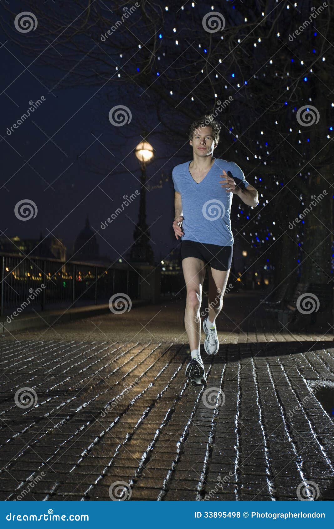 Man Jogging on Street at Night Stock Photo Image of length, energy