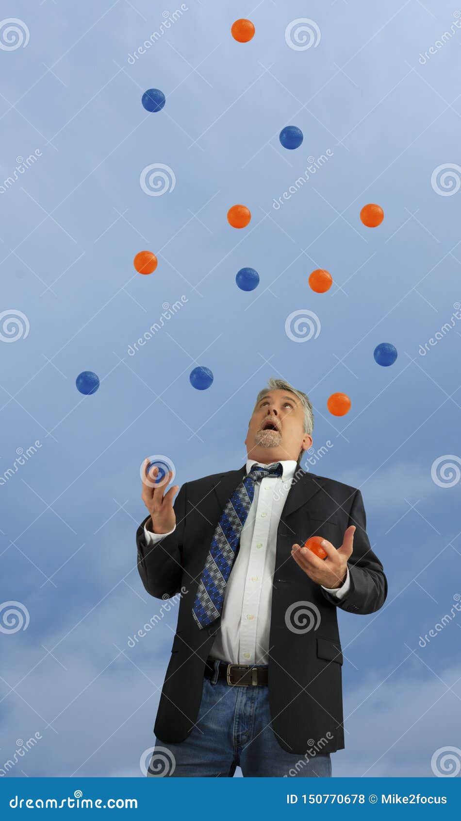 Man Juggling A Lot Of Balls In The Air Representing Being Out Of