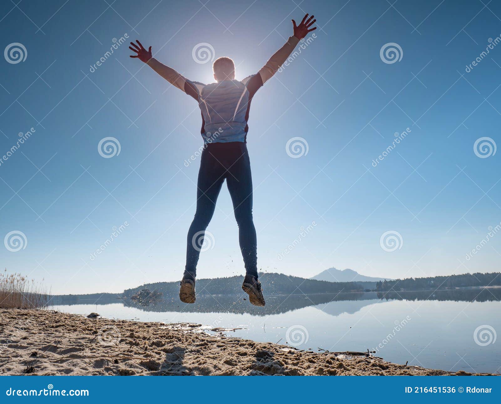 Man Jumping on the Beach at Sunset. Funny Happy Man Stock Photo - Image of handsome, sand: 216451536 Man Jumping on the Beach at Sunset. Funny Happy Man Stock Photo - Image of handsome, sand: 216451536