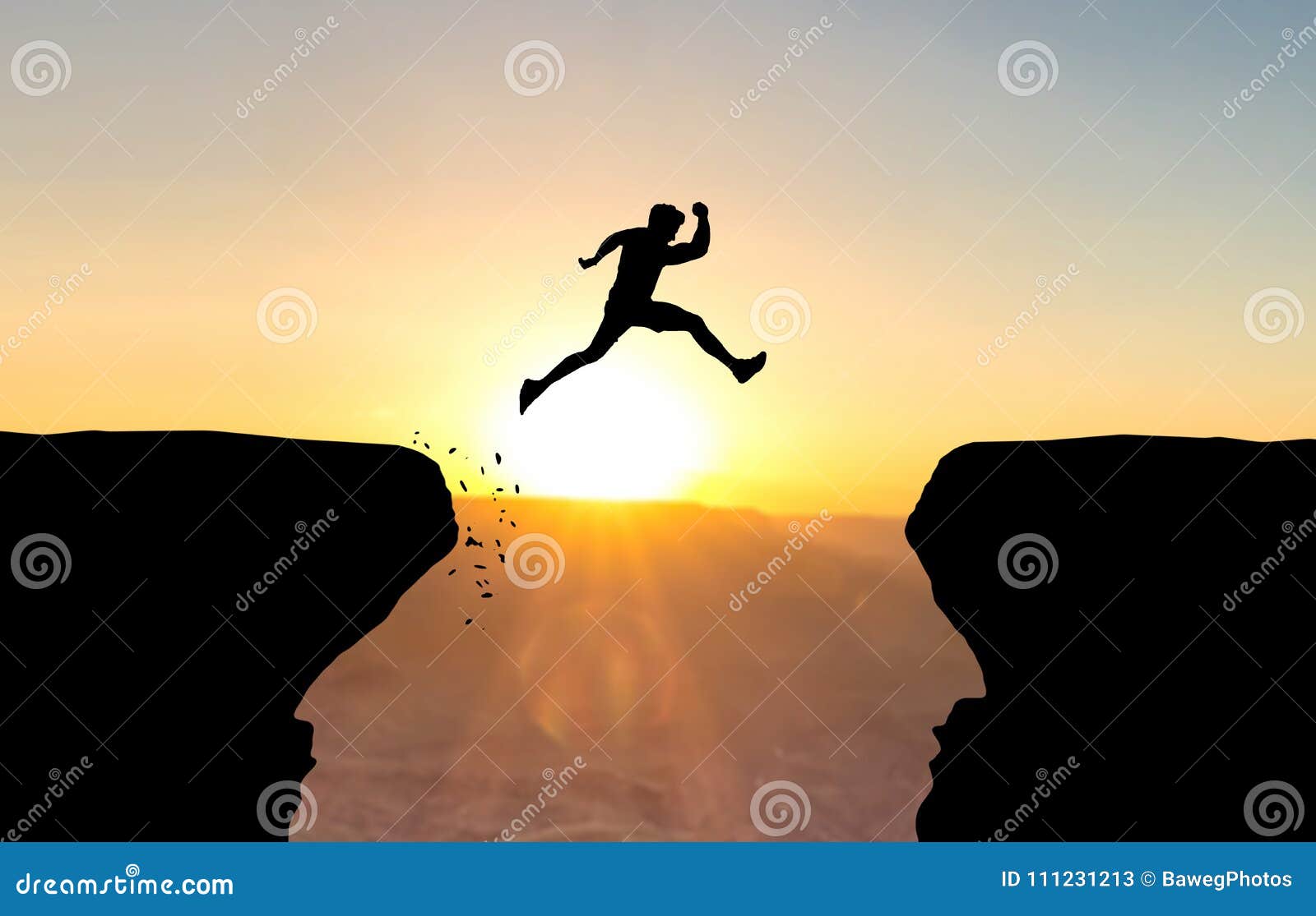 man jumping over abyss.