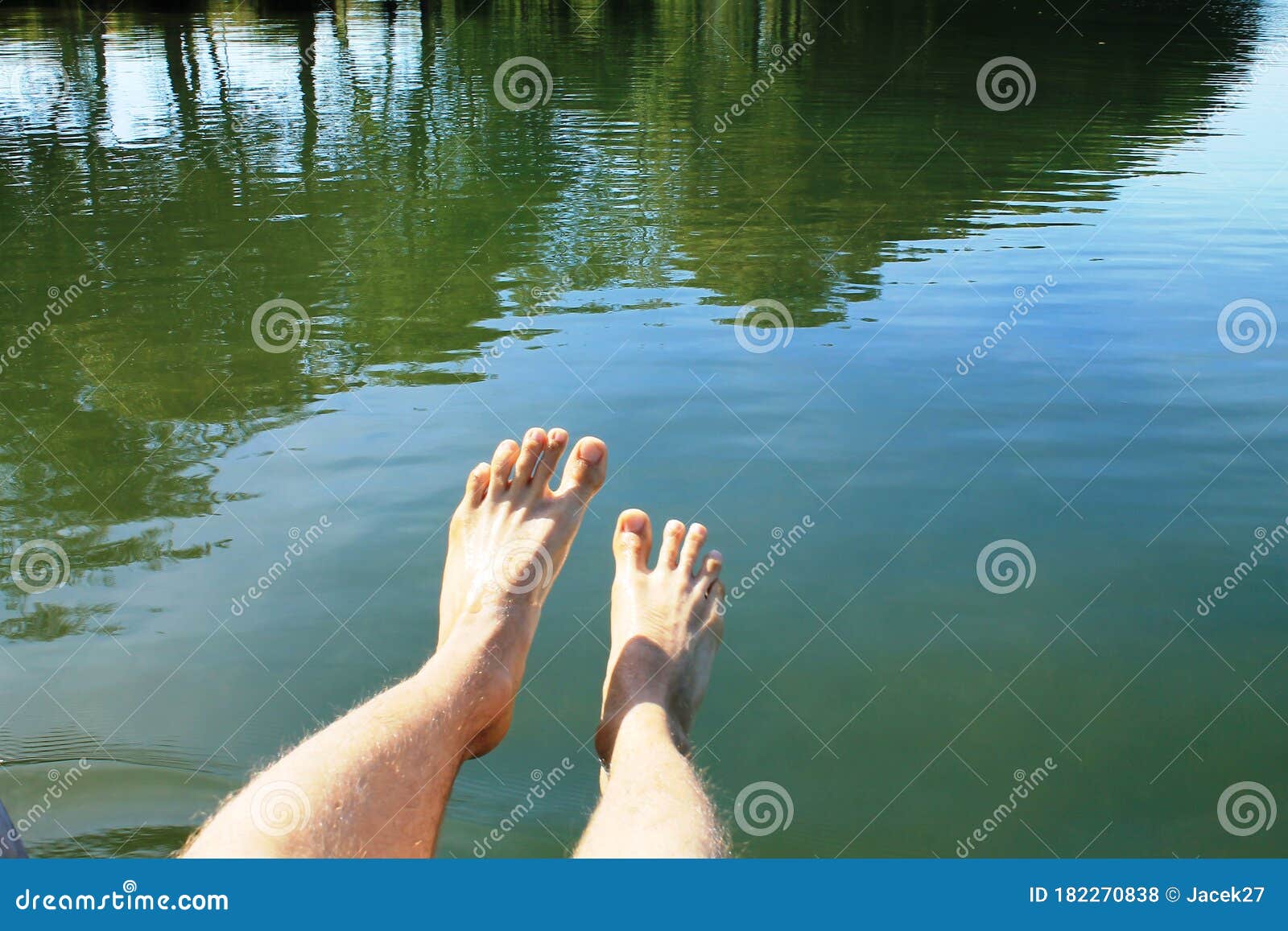 Man jumping into water stock photo. Image of resting 182270838