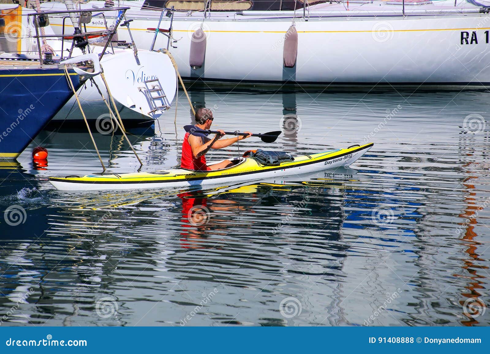 Man Kayaking Along the Boats at Trieste Marina, Italy Editorial Stock Photo  - Image of building, europe: 91408888