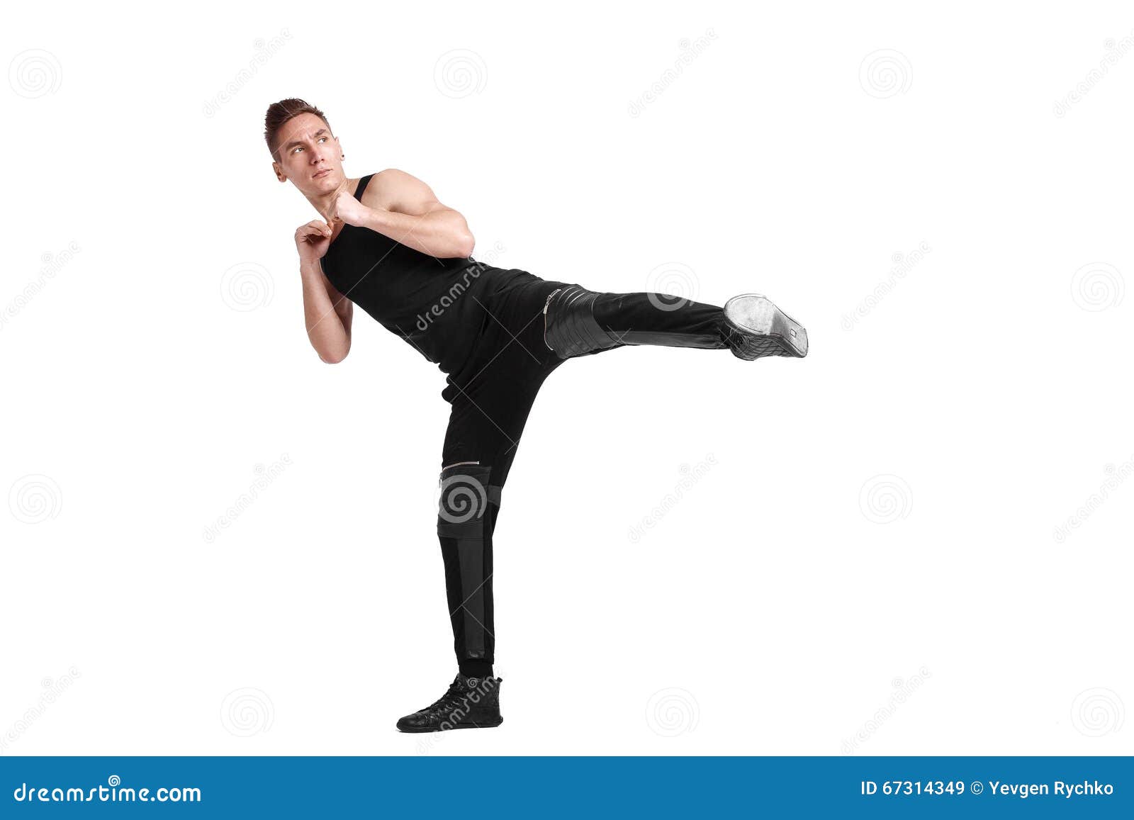 Man kicking foot forward stock image. Image of competitive 67314349