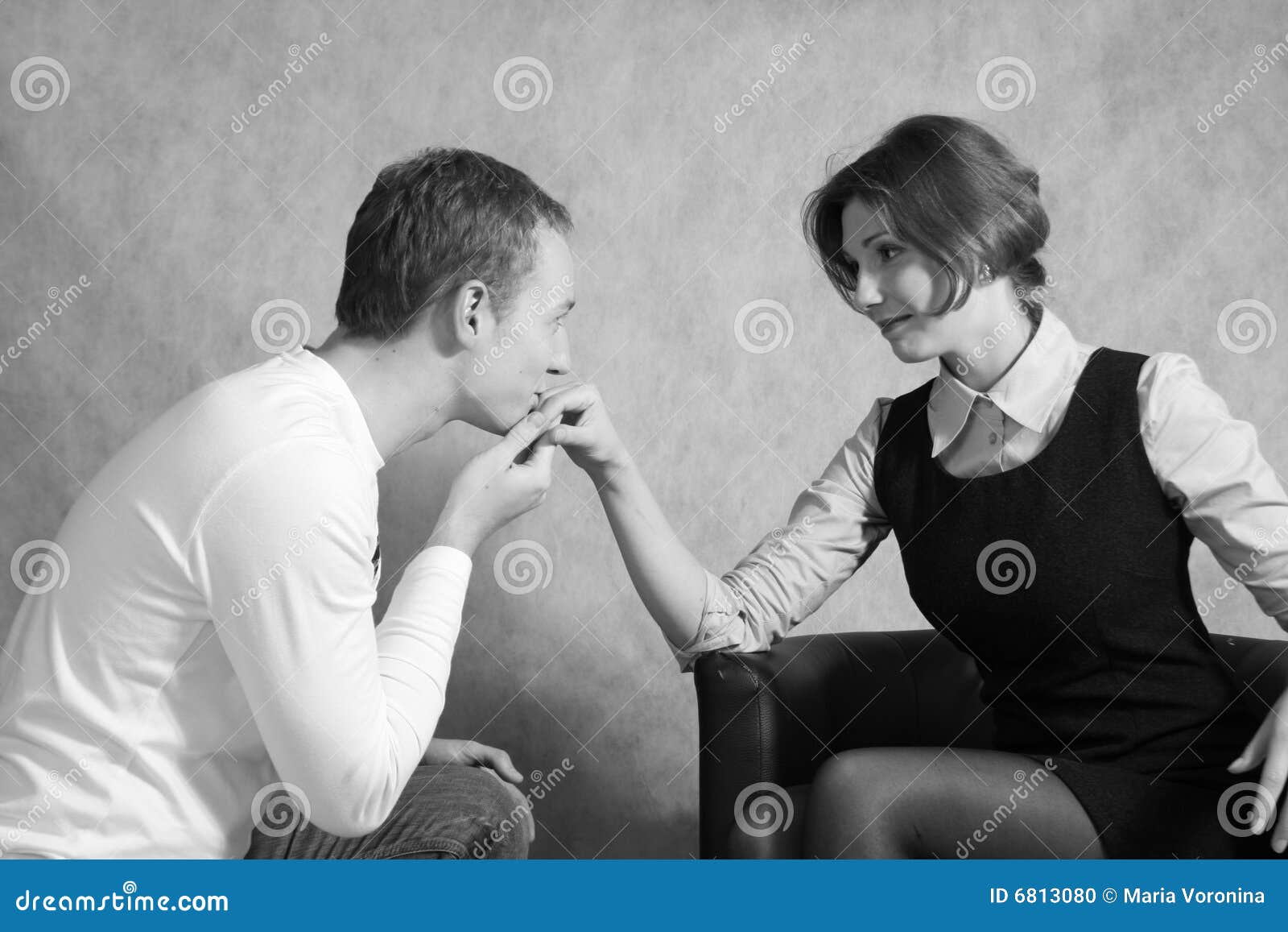 Man Kissing Woman'S Hand To Flatter
