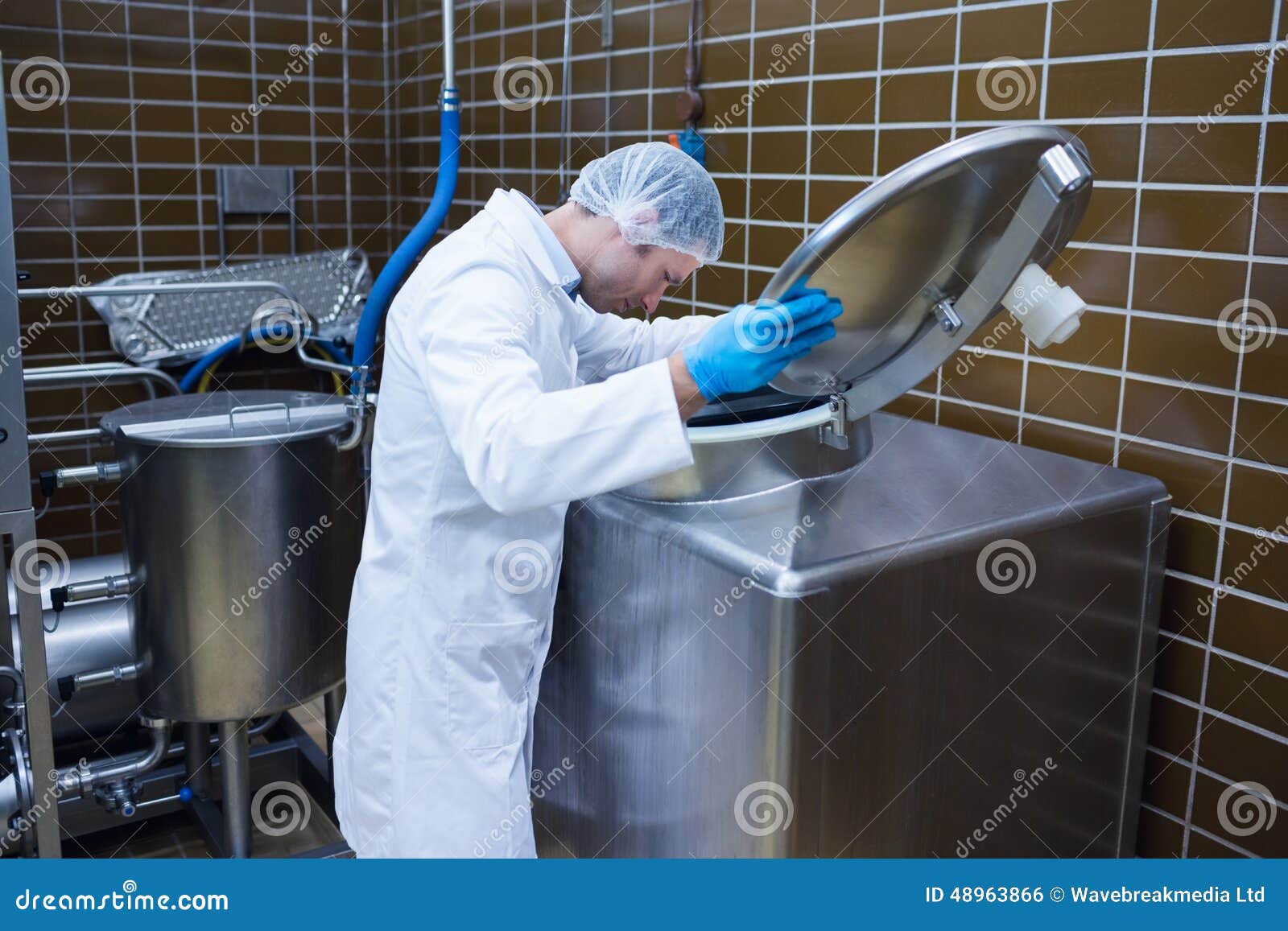 Man in Lab Coat Looking into the Machine Stock Photo Image of adult