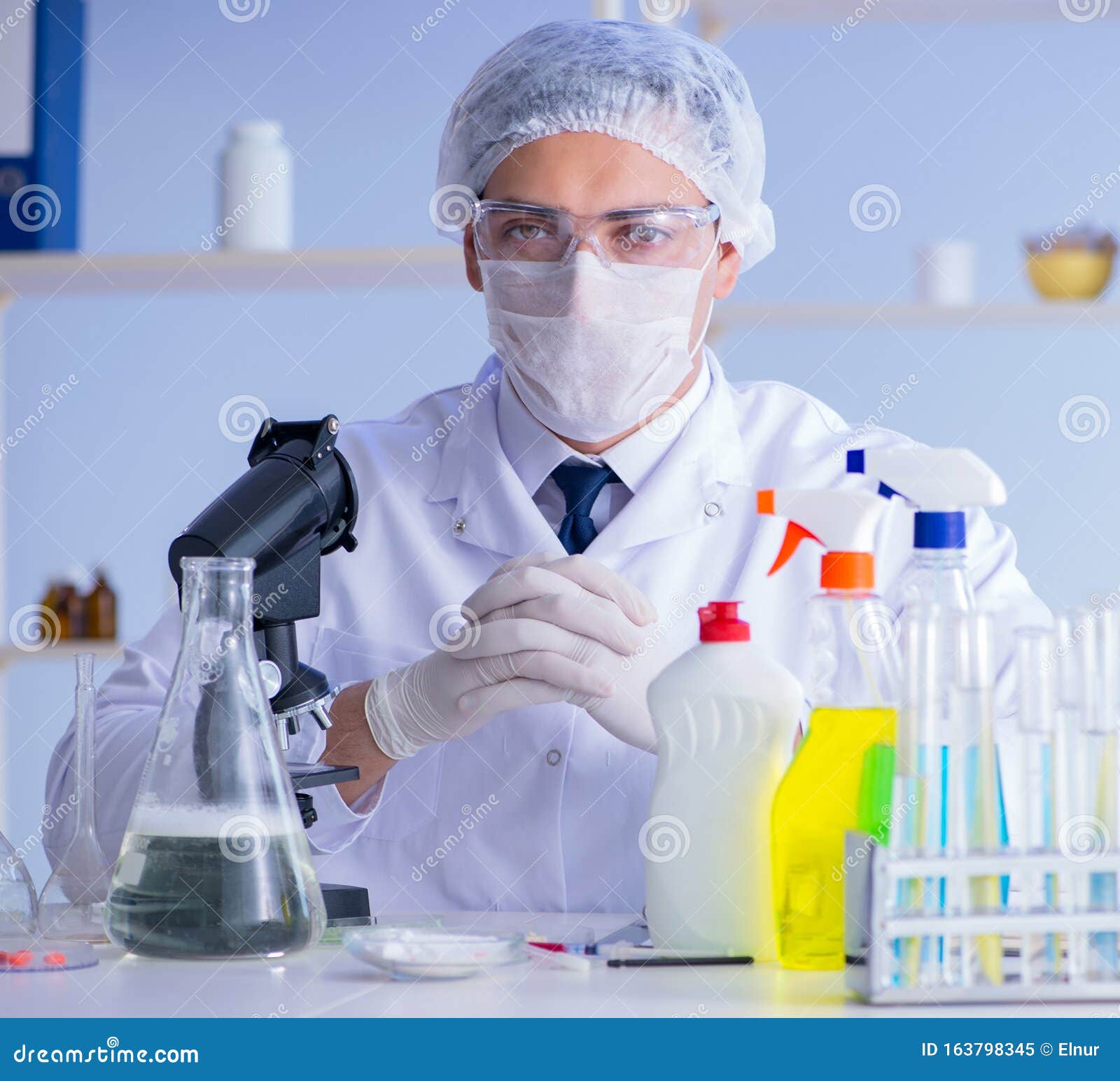 Man in the Lab Testing New Cleaning Solution Detergent Stock Image