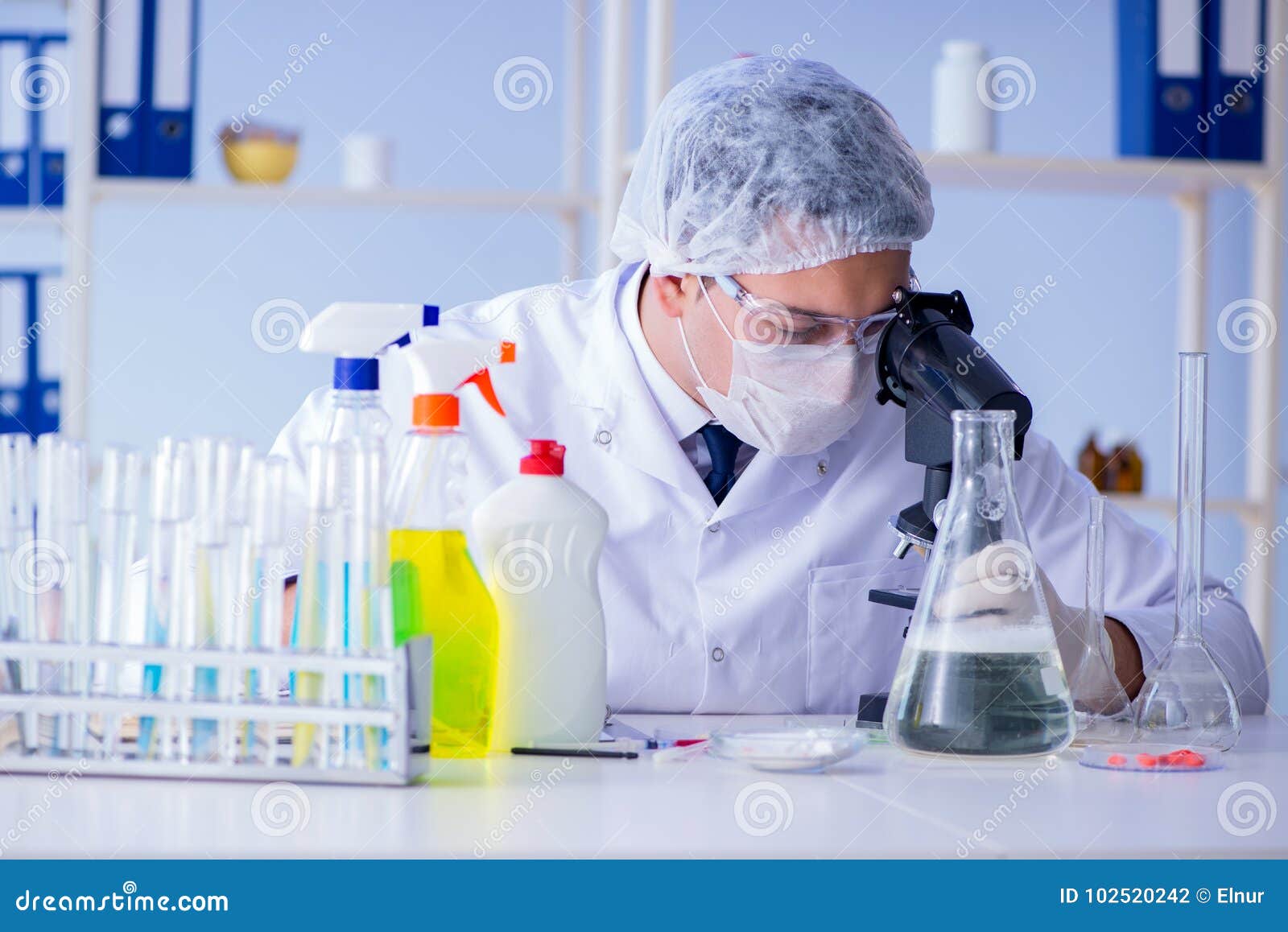 The Man in the Lab Testing New Cleaning Solution Detergent Stock Photo