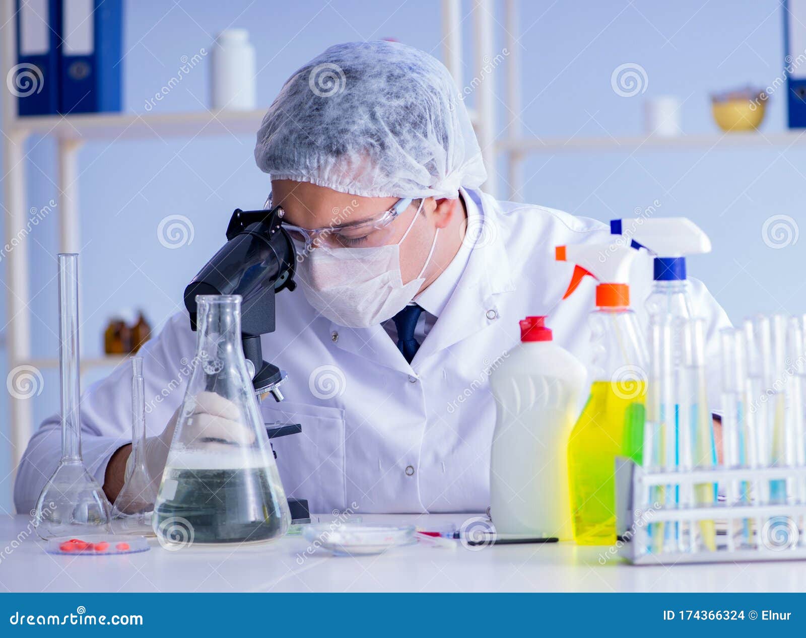 Man in the Lab Testing New Cleaning Solution Detergent Stock Photo