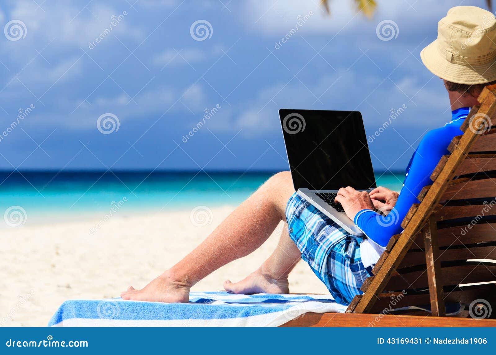 Man with Laptop on Tropical Vacation Stock Image - Image of sunhat ...