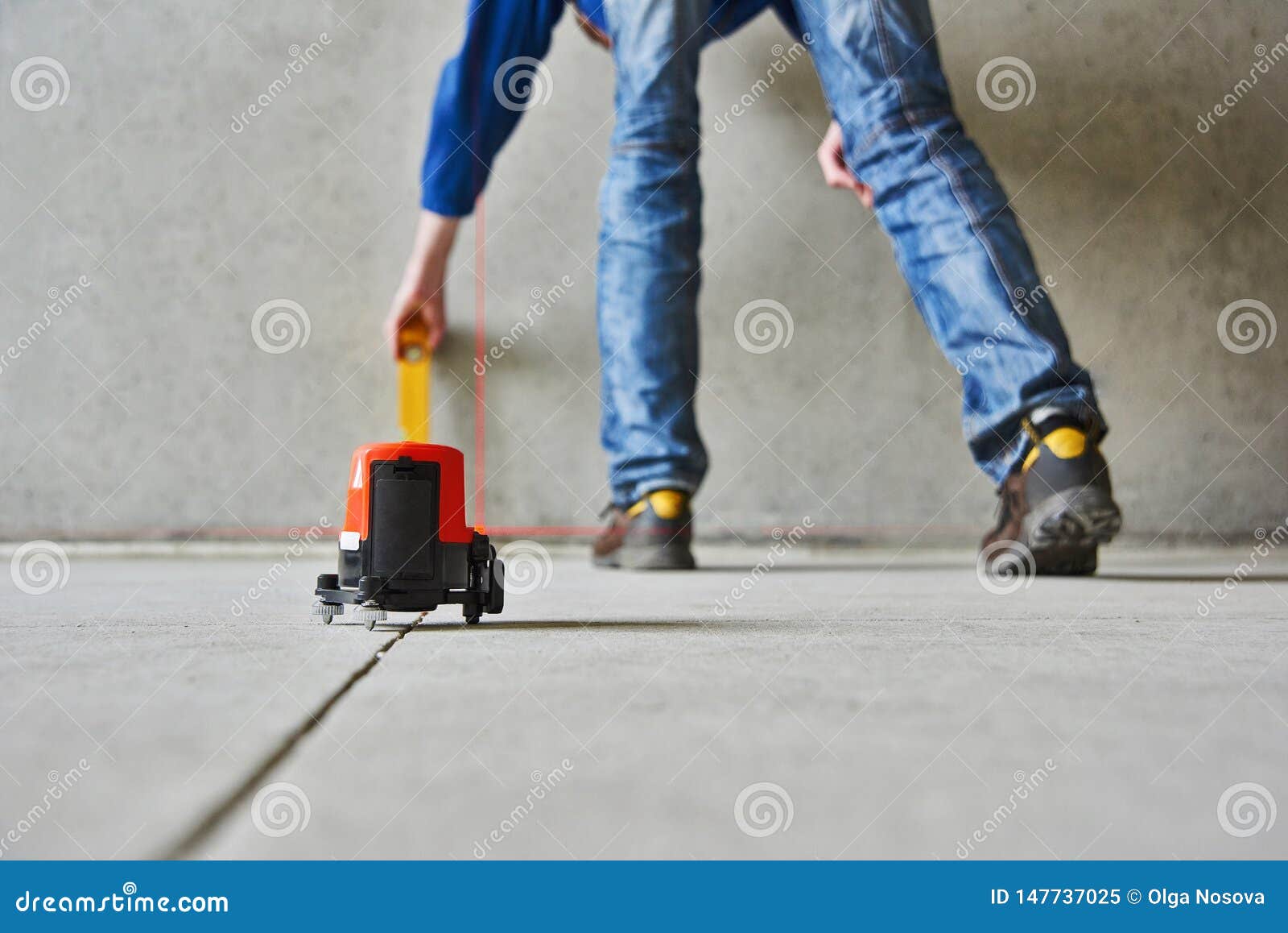 Man With Laser Level Check Floor And Walls Stock Image Image Of