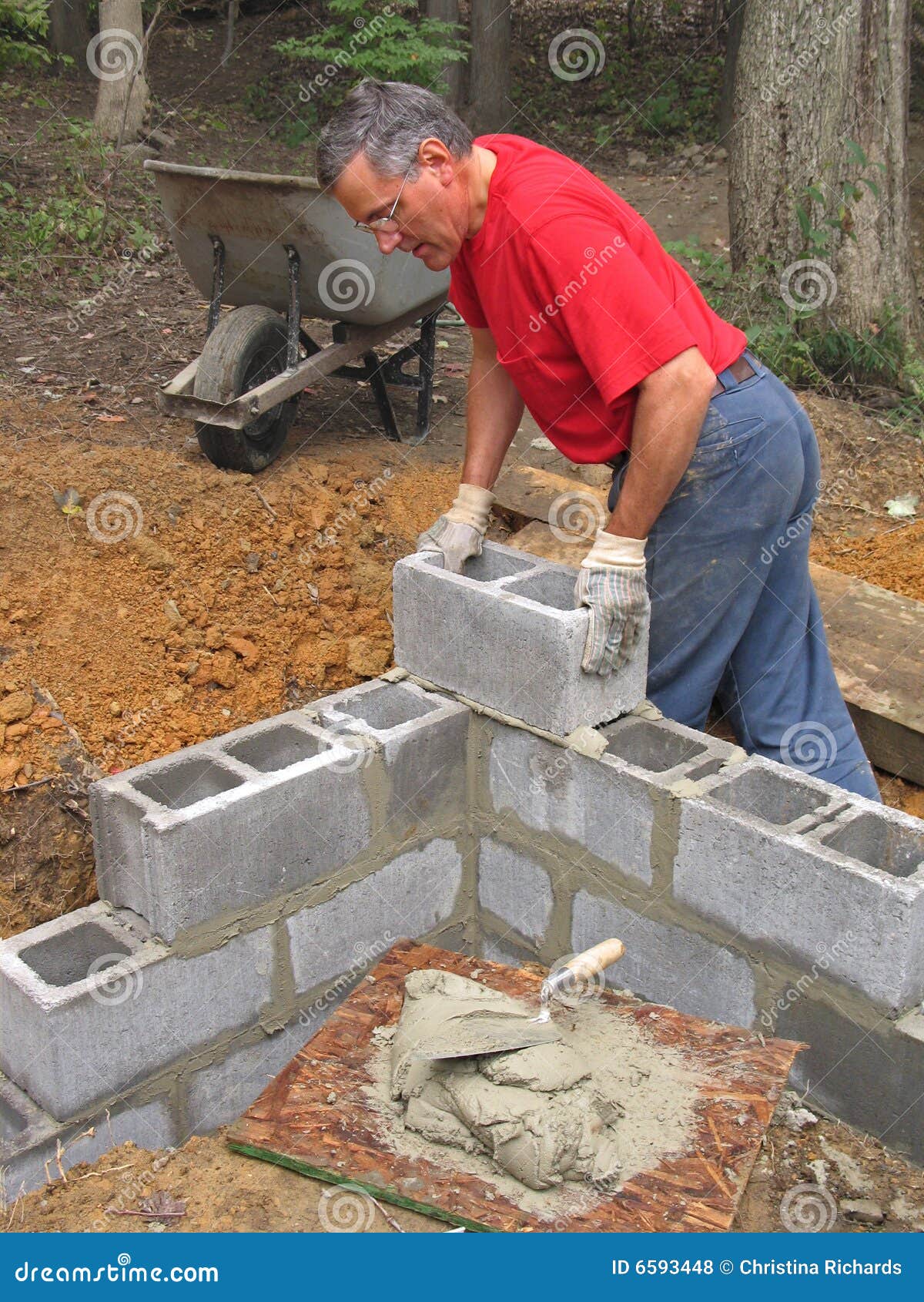 Man Laying Concrete Block Wall Royalty Free Stock Photos - Image: 6593448