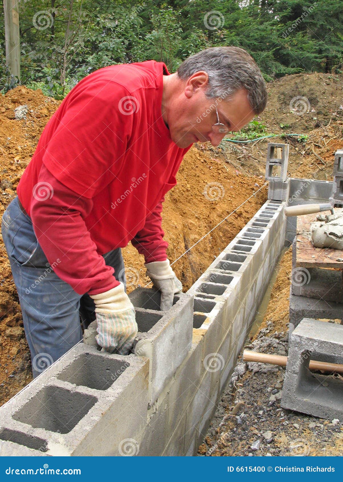 Man Laying Concrete Block Wall Stock Photo - Image: 6615400