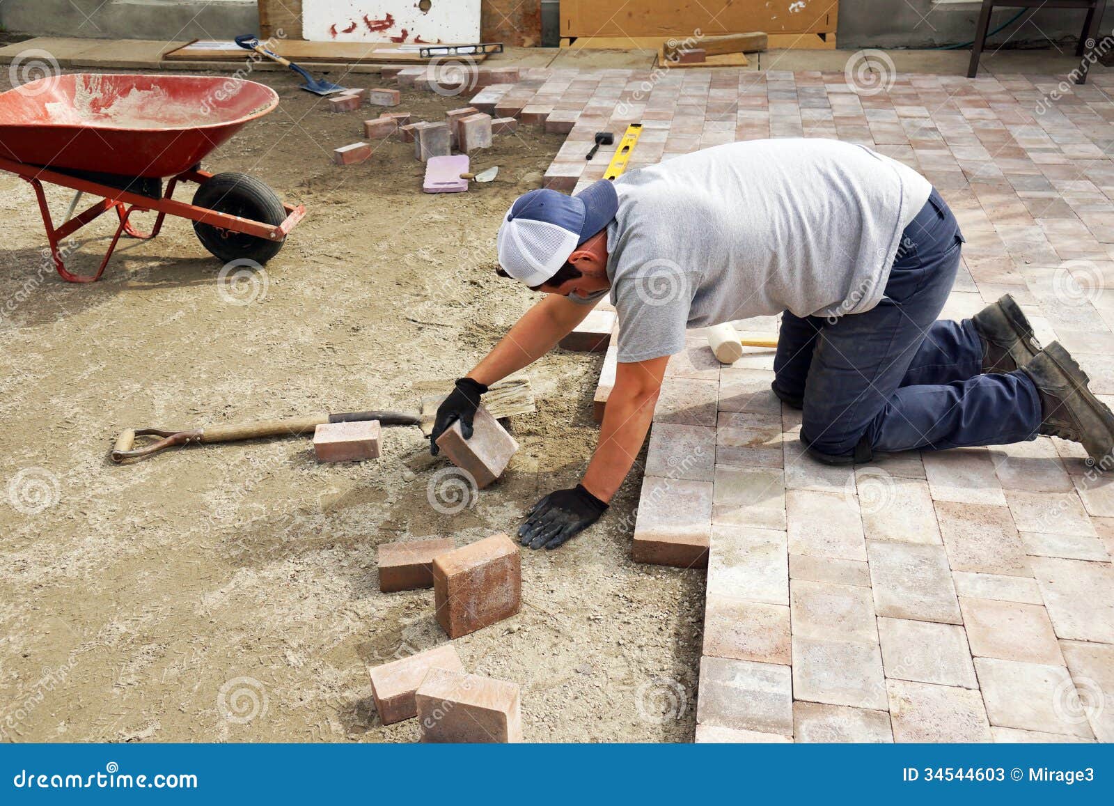 Man Laying Down Paver Stock Photos Image 34544603