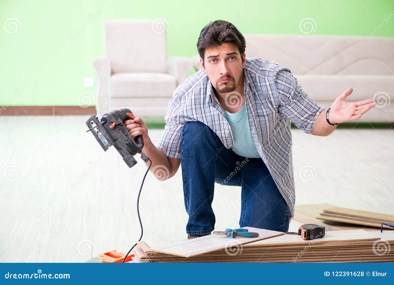 The Man Laying Flooring at Home Stock Photo Image of jigsaw, laminate