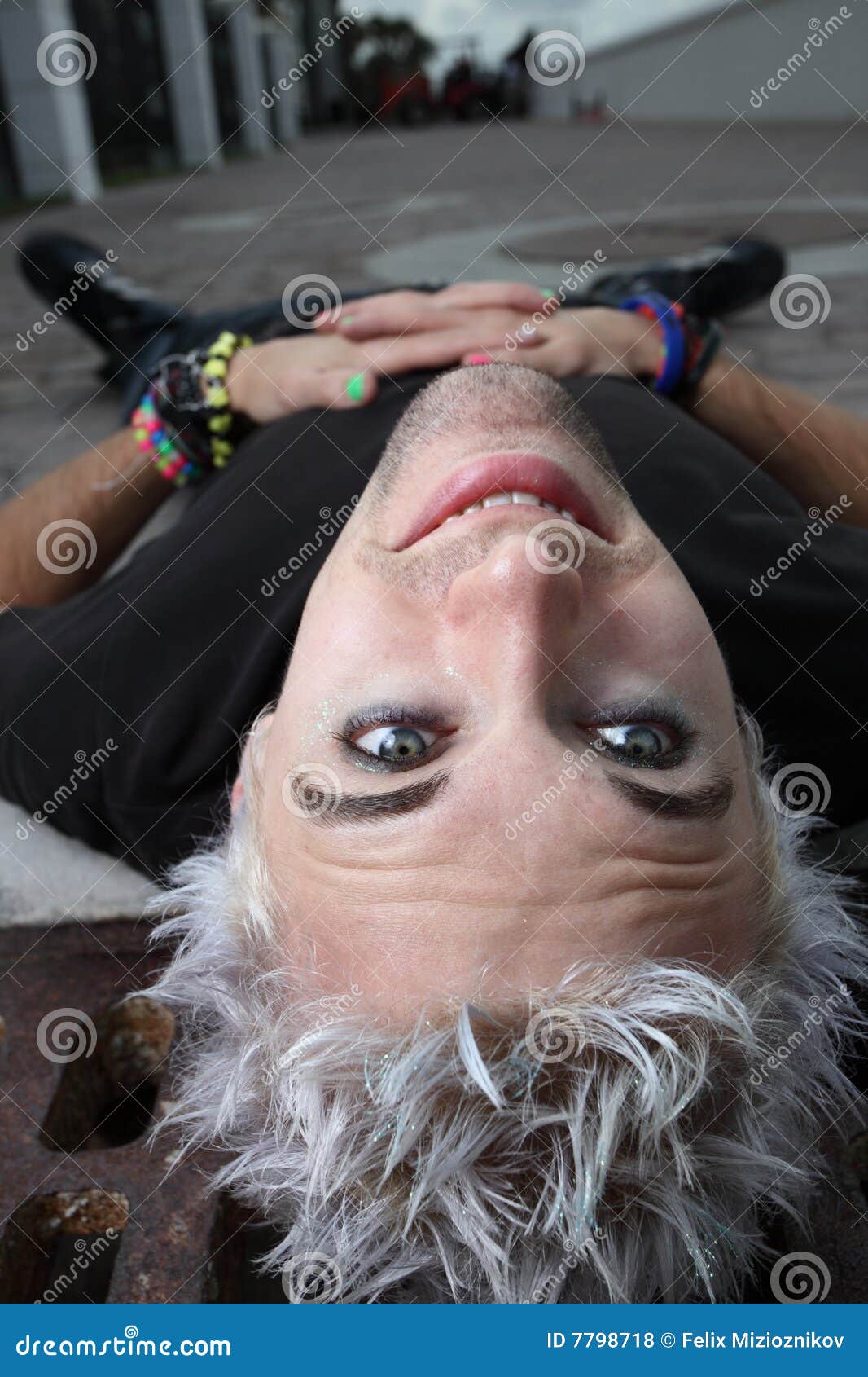 Man laying on the ground stock photo. Image of young, punk 
