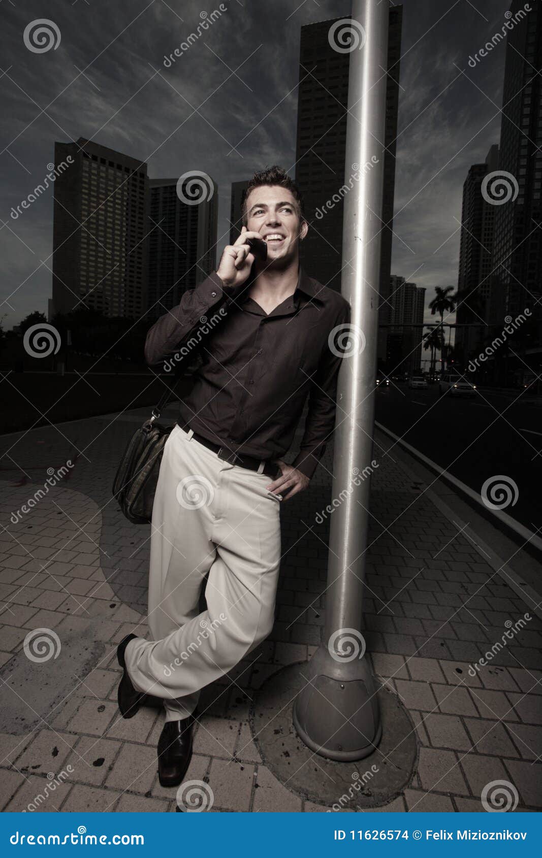 Leaning On Pole Leaning On A Pole Stock Photo Image Of Handsome