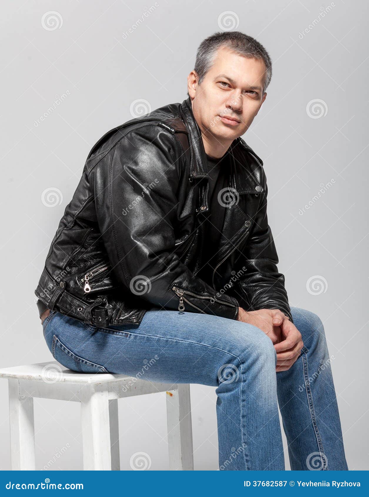 Man in Leather Jacket Sitting on Chair Stock Image Image of leather