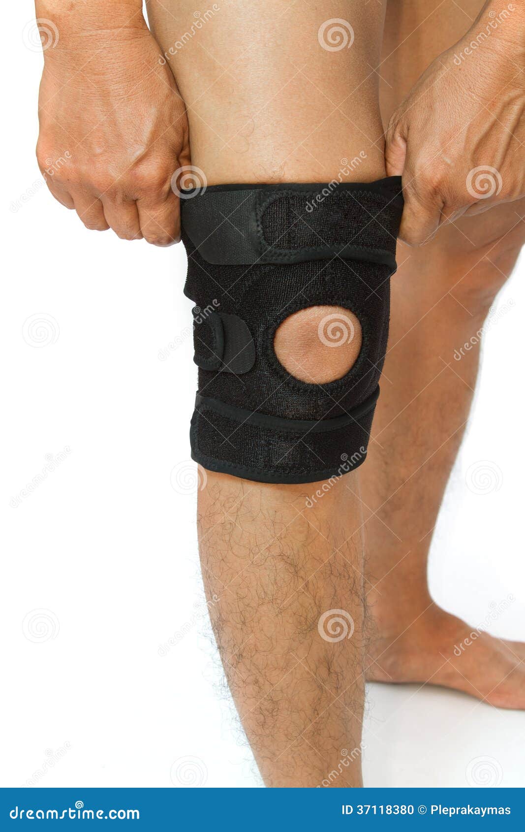 Man Legs with One Knee in a Protective Knee Brace Stock Photo Image