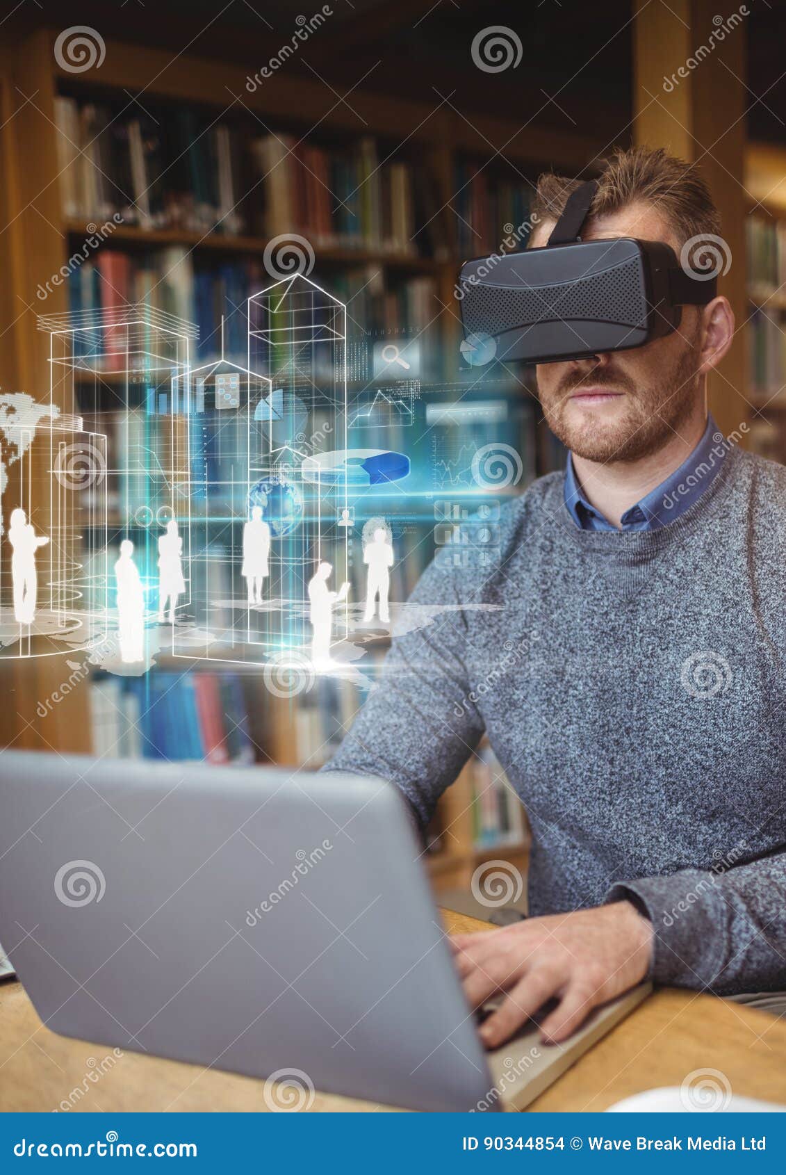 Man in Library on Laptop Wearing VR Virtual Reality Headset with Interface Stock Photo Image