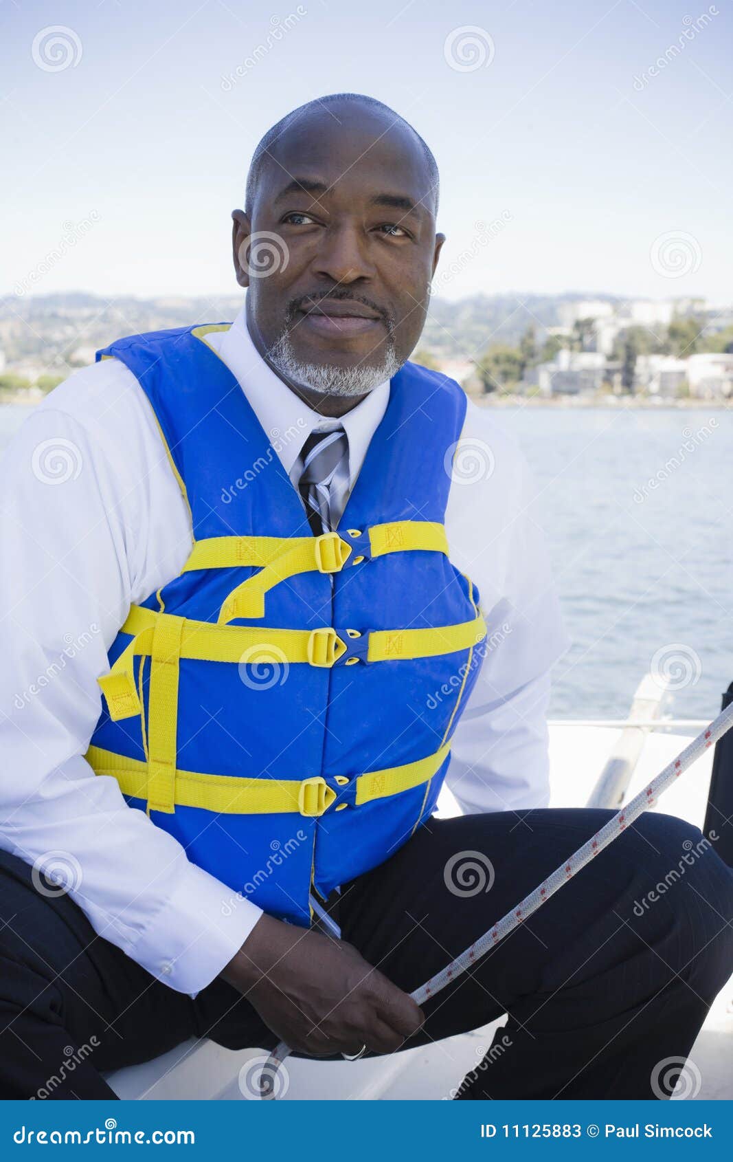 Man in Life Vest on Sailboat Stock Image Image of businessman
