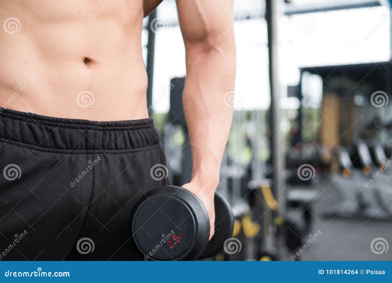 Man Lift Dumbbell In Gym Bodybuilder Male Working Out In Fitness