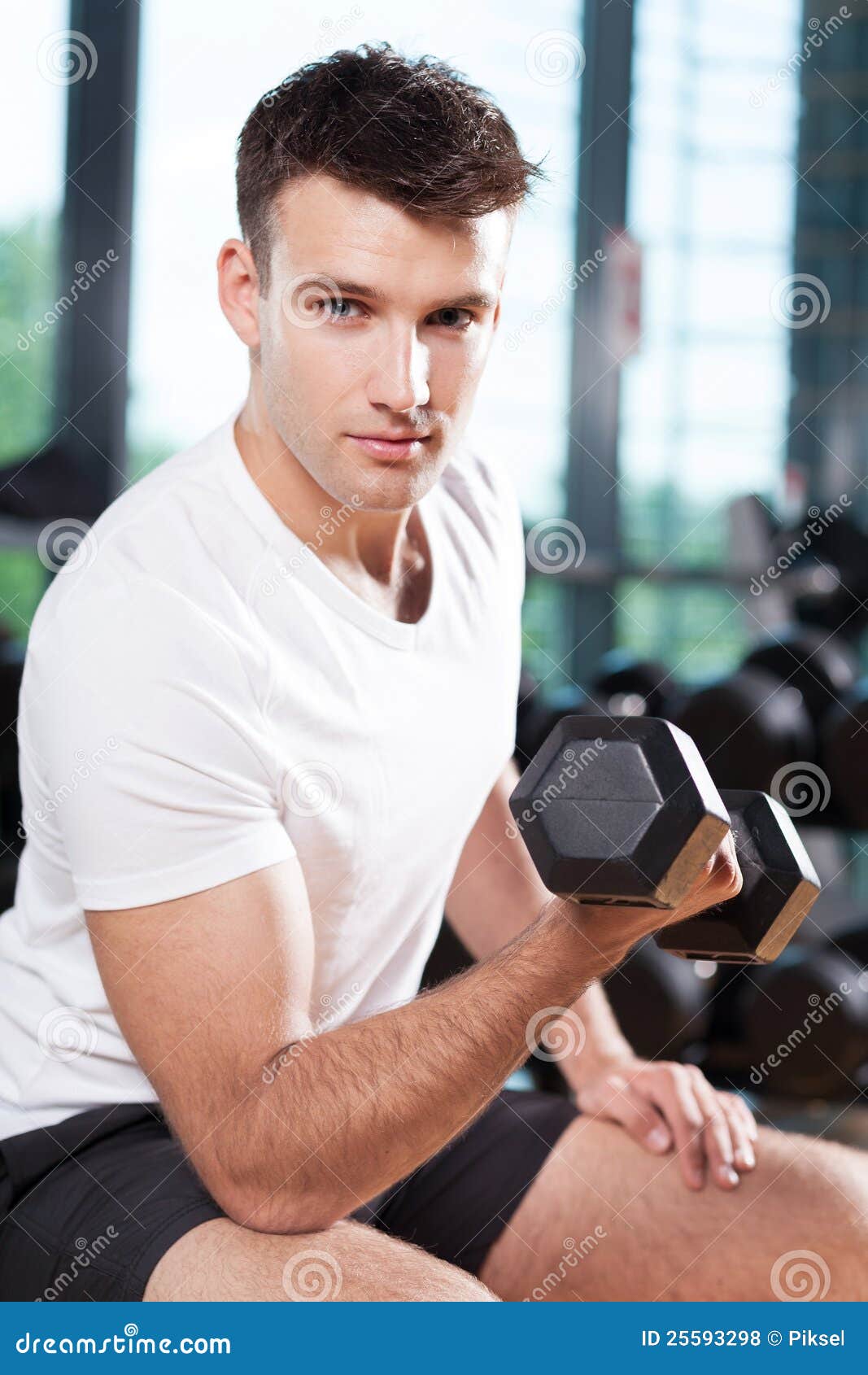 Man Lifting Dumbbell stock photo. Image of person, dumbbell - 25593298