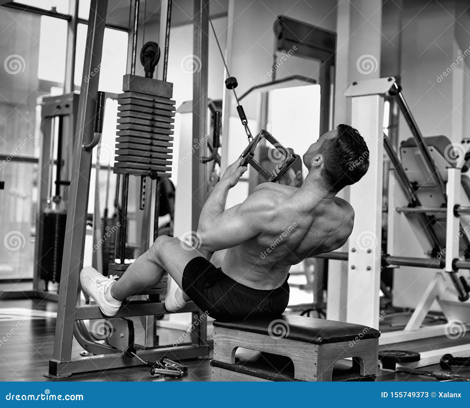 Workout at cable machine stock image. Image of machine 155749373